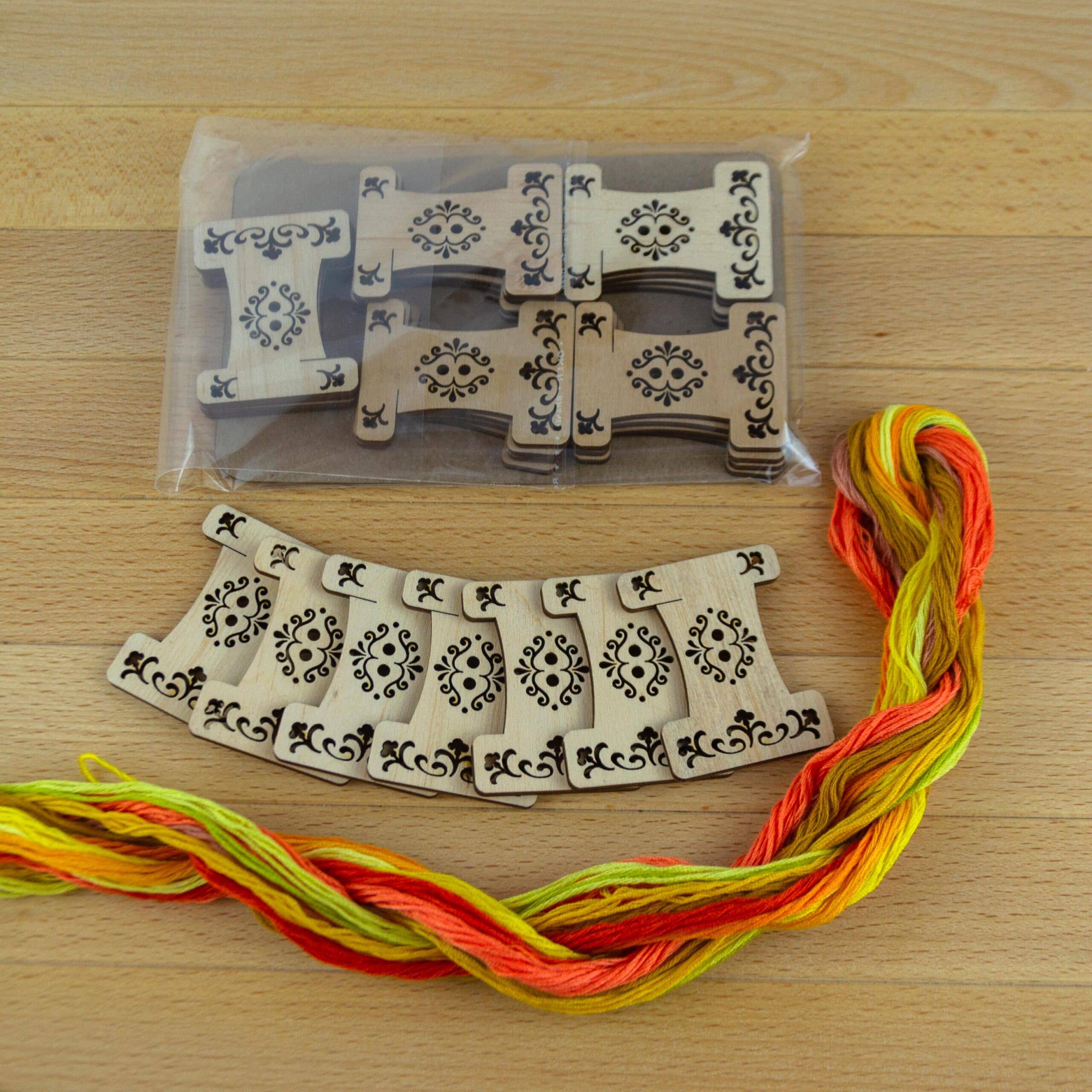 Engraved wooden thread bobbins for embroidery thread (10 per pack)
