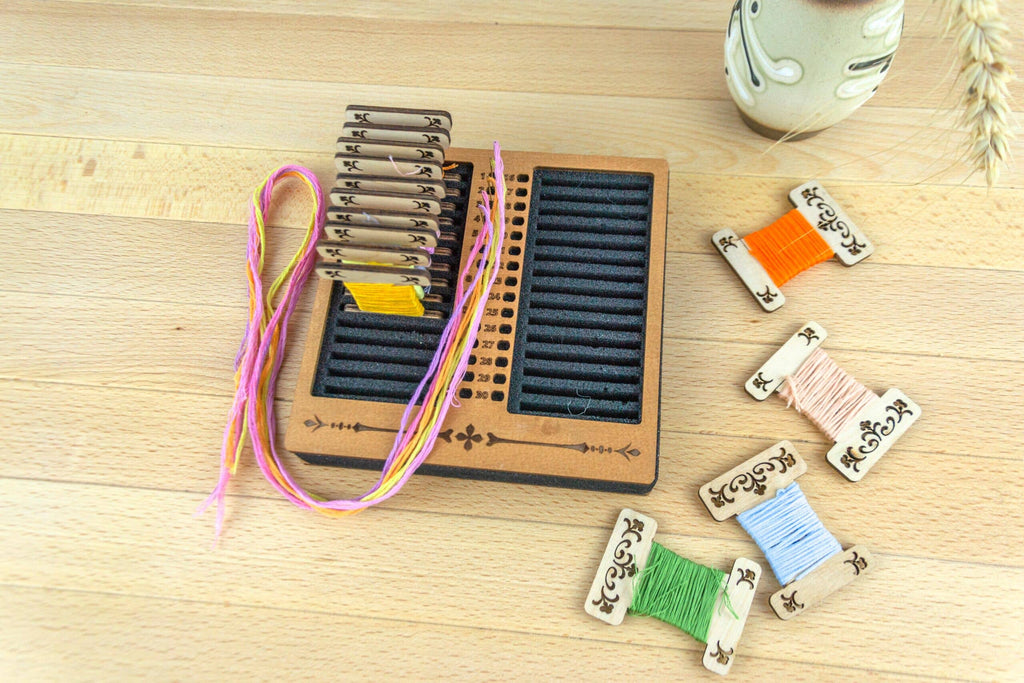 Square foam stand for wooden, acrylic and other bobbins (spools) thickness 3mm with holes for needles