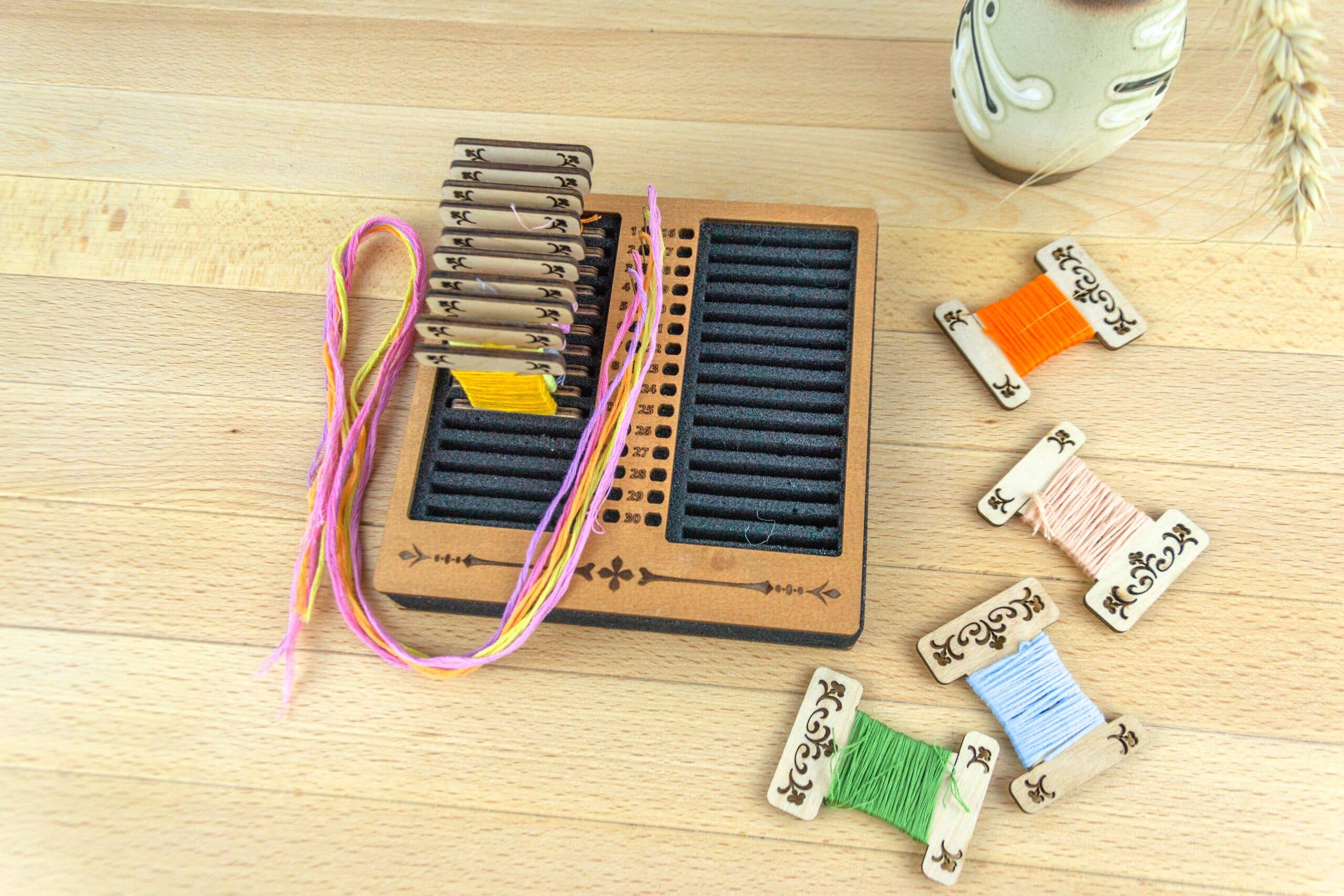 Square foam stand for wooden, acrylic and other bobbins (spools) thickness 3mm with holes for needles
