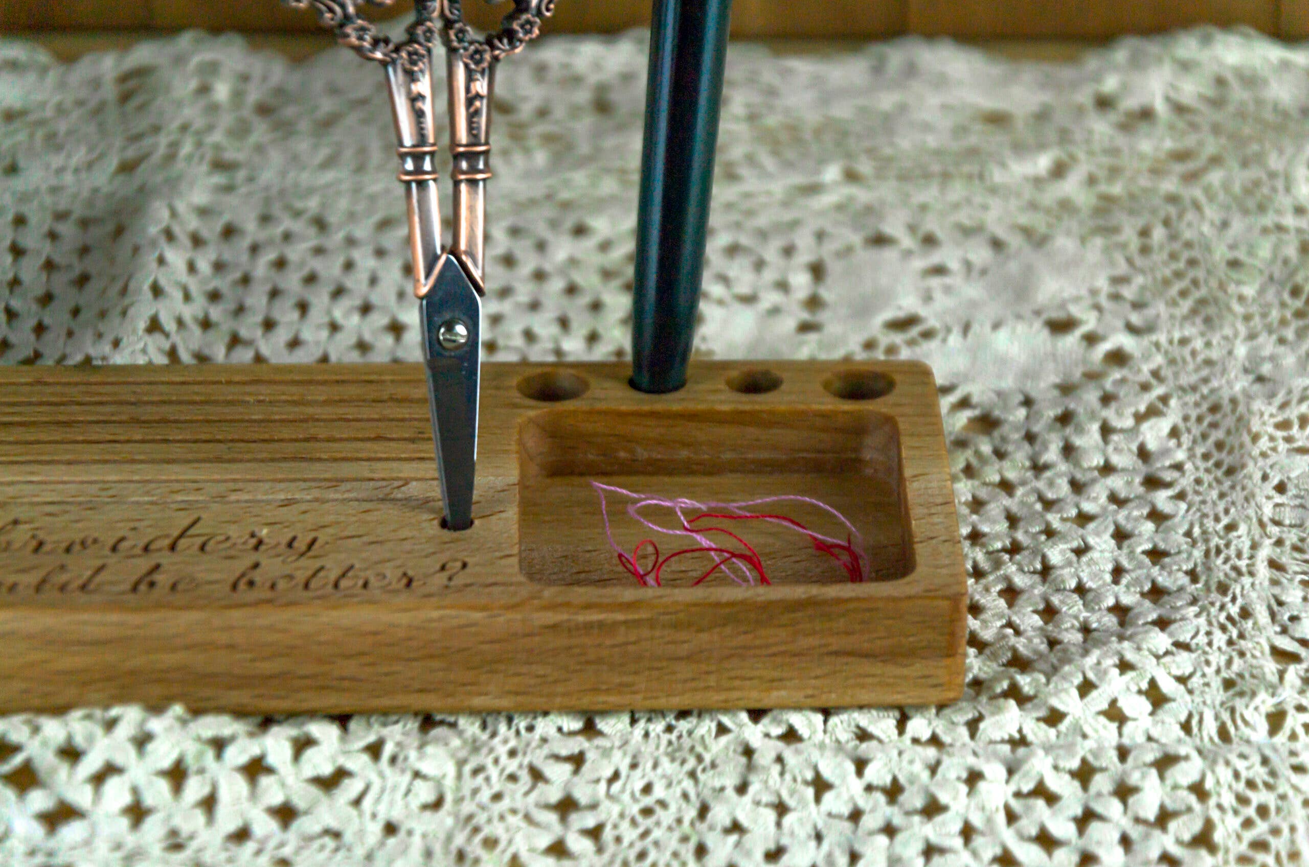 Phone holder organiser for needles, scissors and bobbins