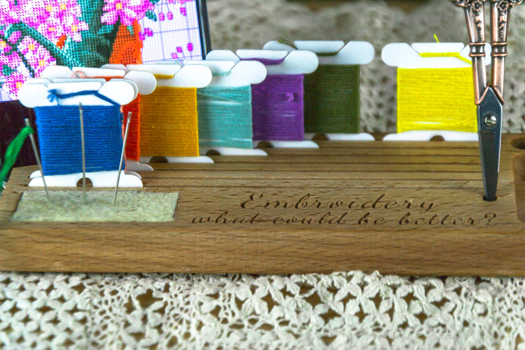 Phone holder organiser for needles, scissors and bobbins