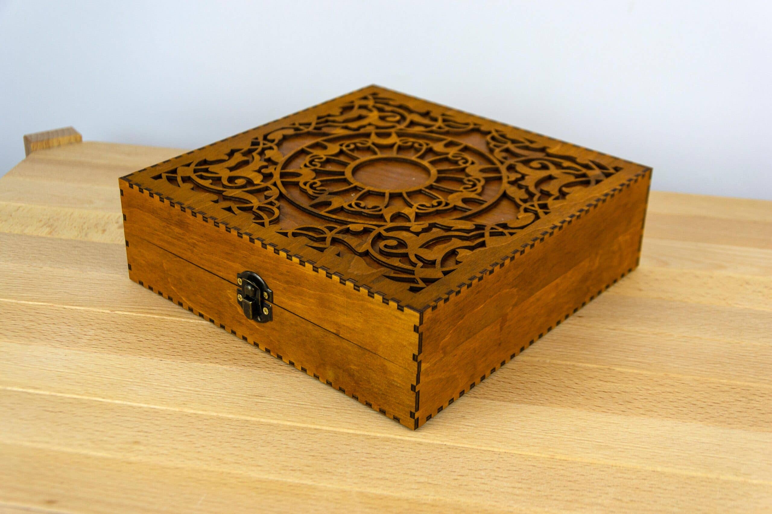 Engraved wooden box for embroidery bobbins