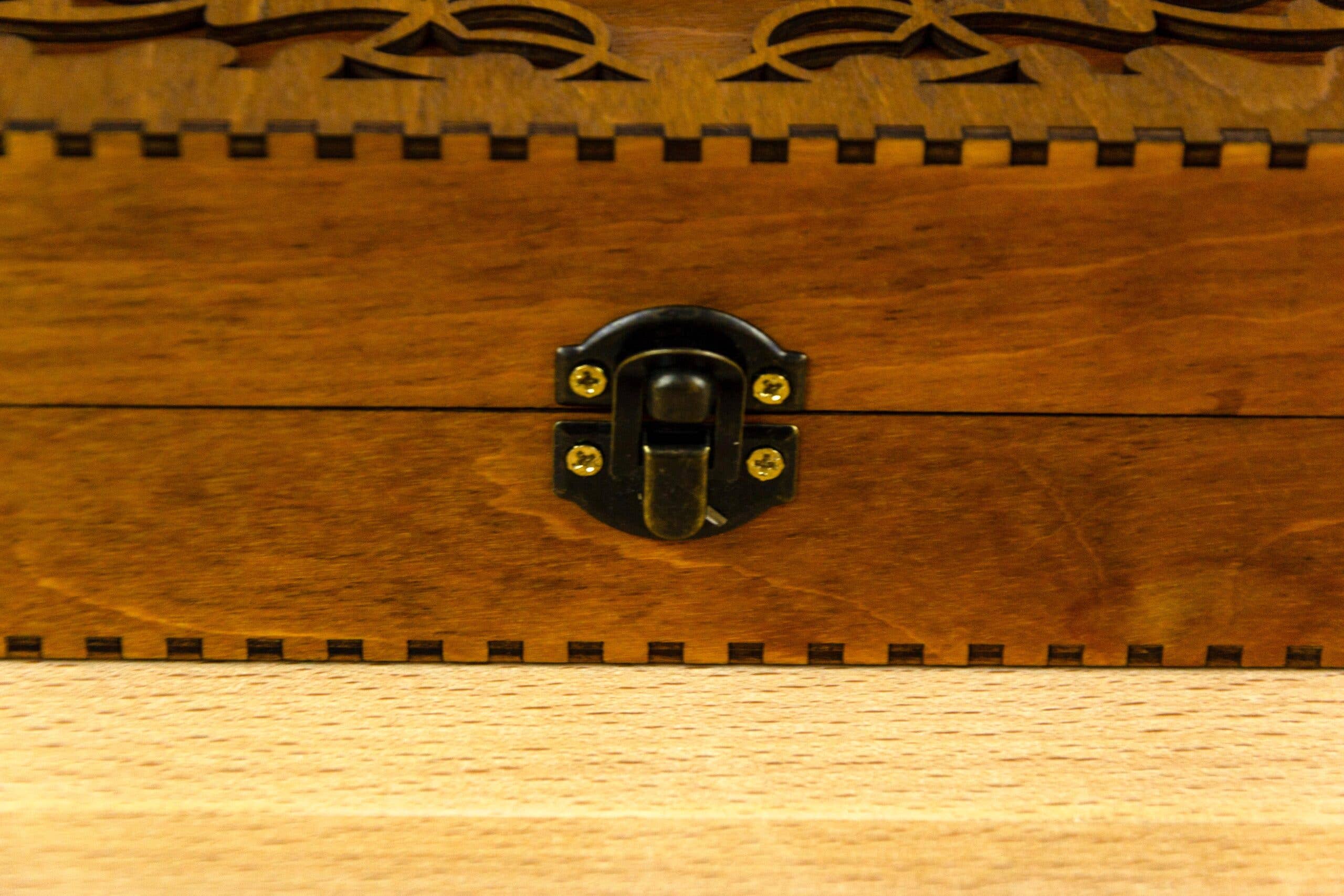 Engraved wooden box for embroidery bobbins