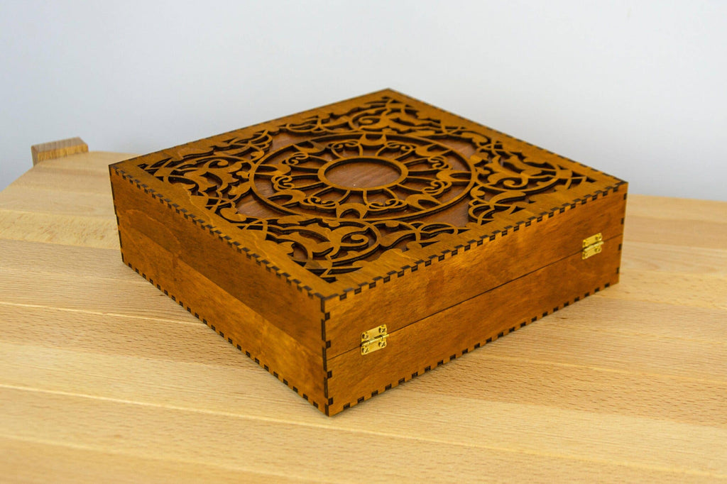 Engraved wooden box for embroidery bobbins