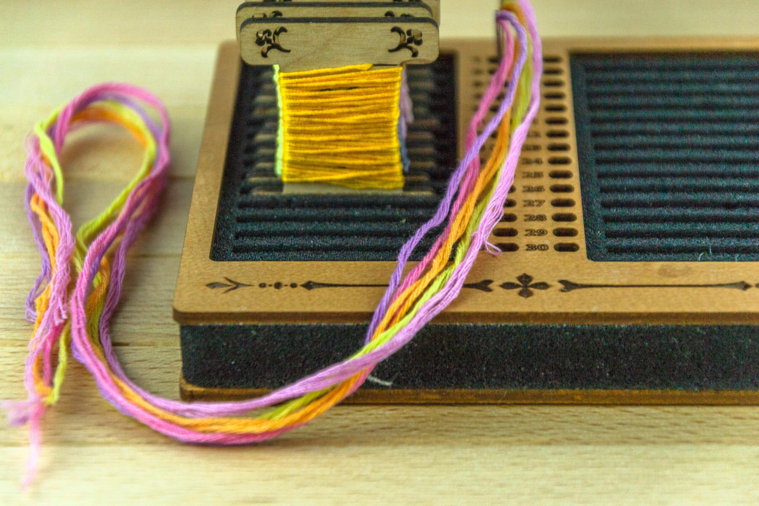 Square foam stand for wooden, acrylic and other bobbins (spools) thickness 3mm with holes for needles