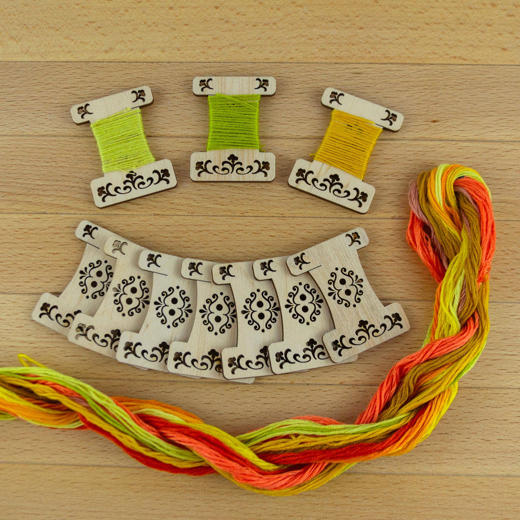 Engraved wooden thread bobbins for embroidery thread (10 per pack)
