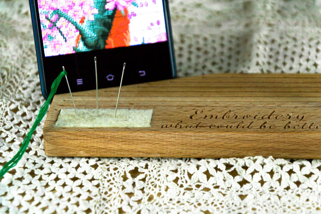 Phone holder organiser for needles, scissors and bobbins