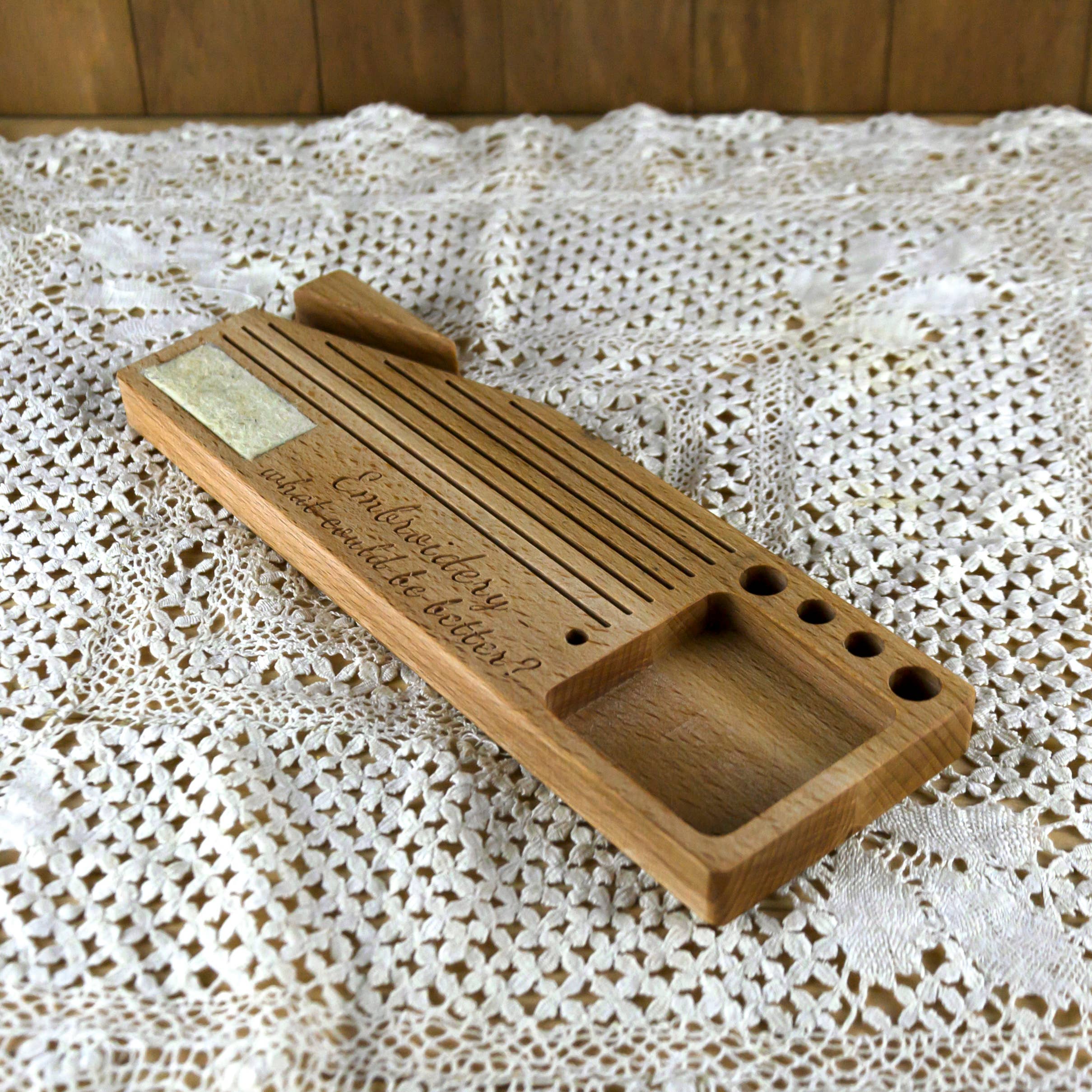Phone holder organiser for needles, scissors and bobbins