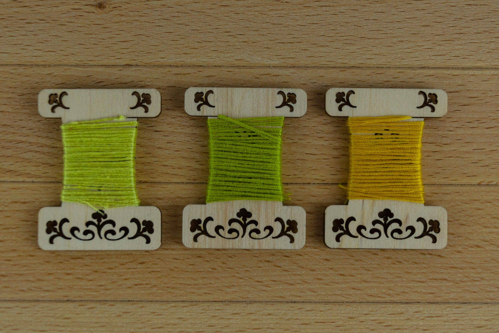 Engraved wooden thread bobbins for embroidery thread (10 per pack)