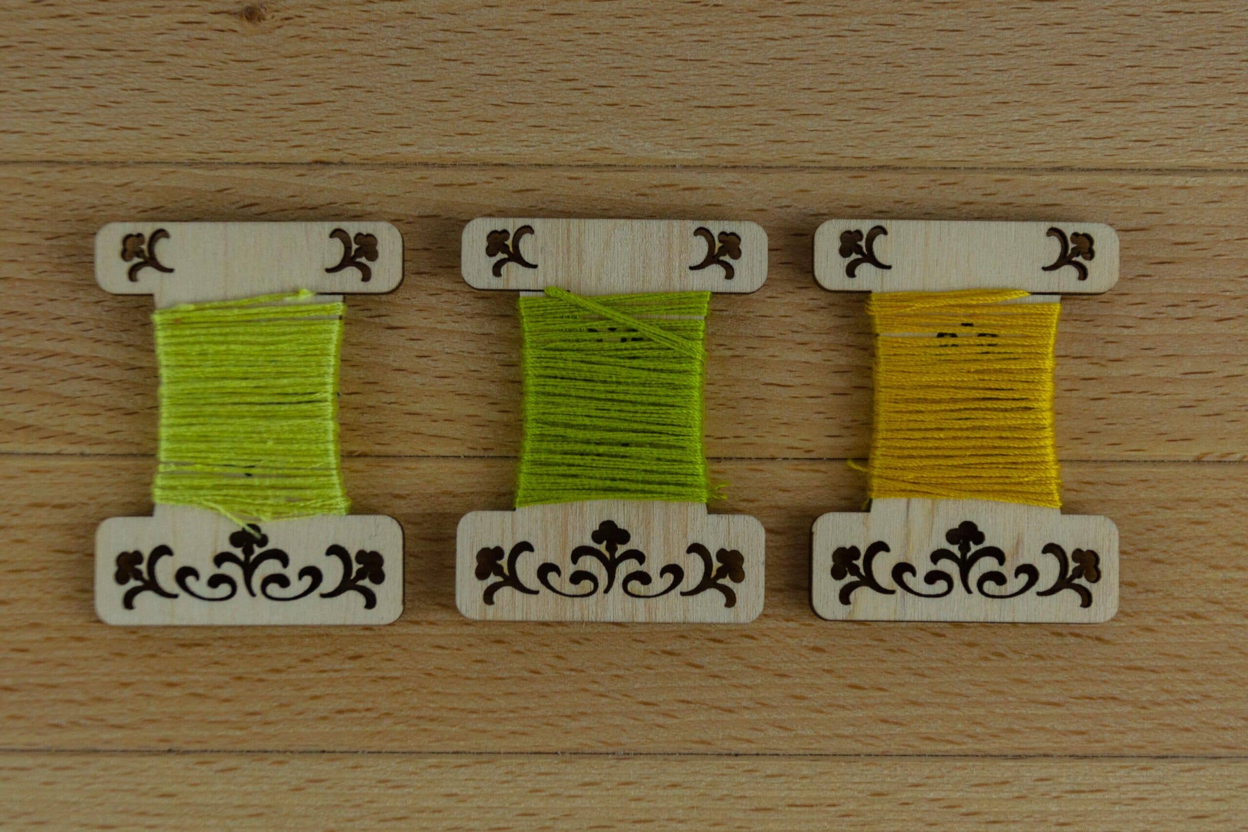 Engraved wooden thread bobbins for embroidery thread (10 per pack)