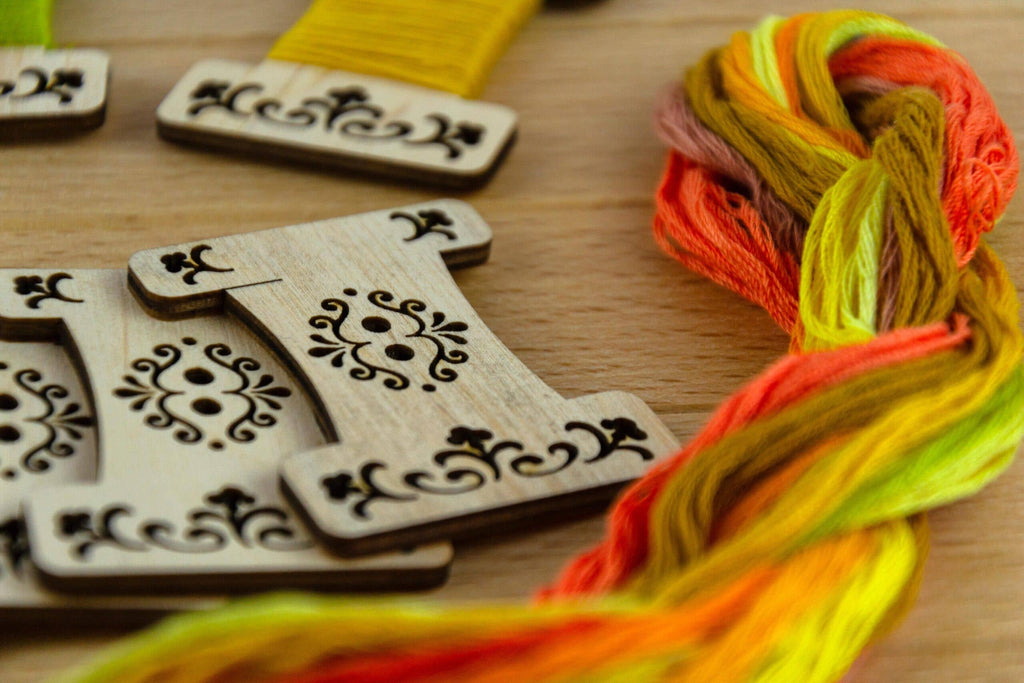 Engraved wooden thread bobbins for embroidery thread (10 per pack)