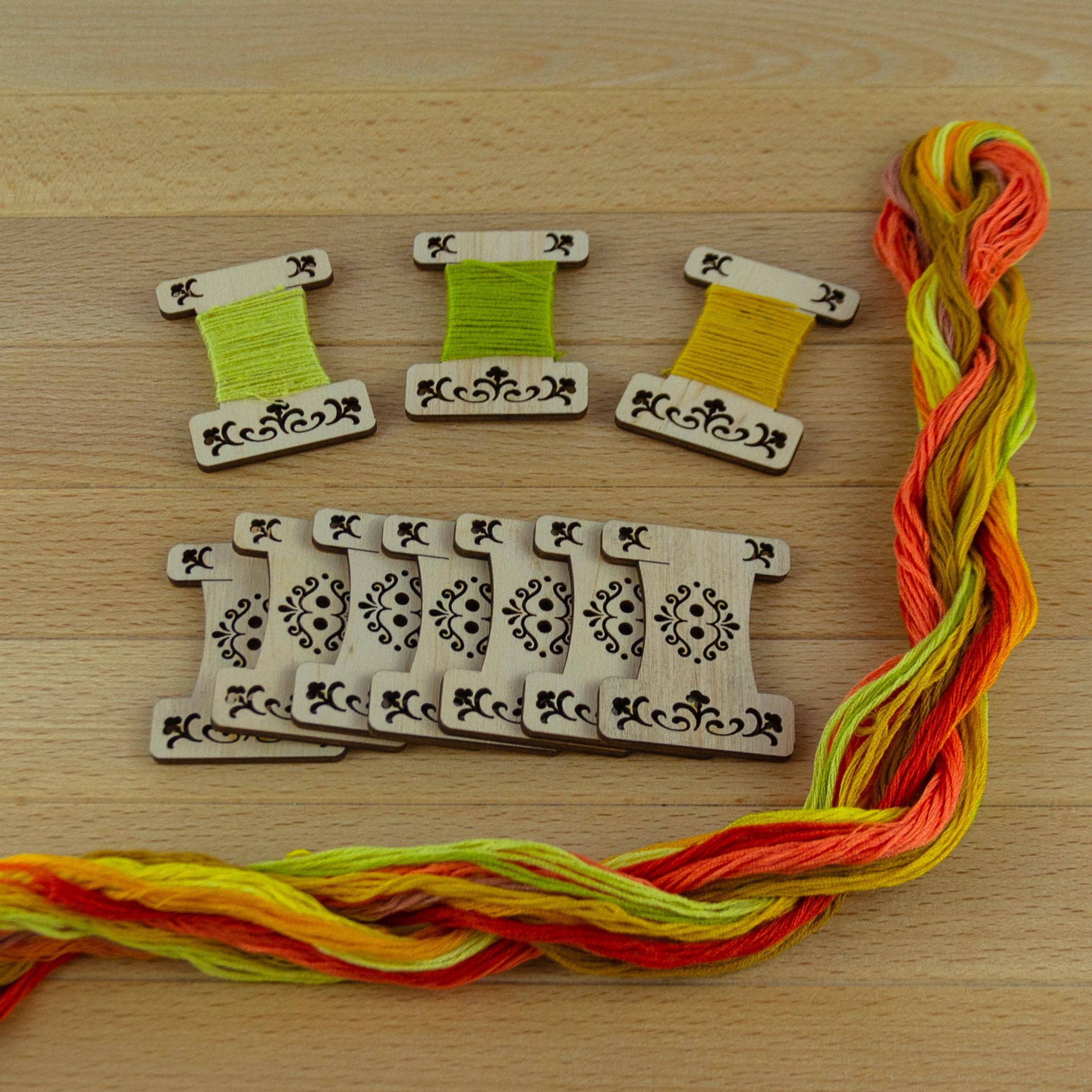 Engraved wooden thread bobbins for embroidery thread (10 per pack)