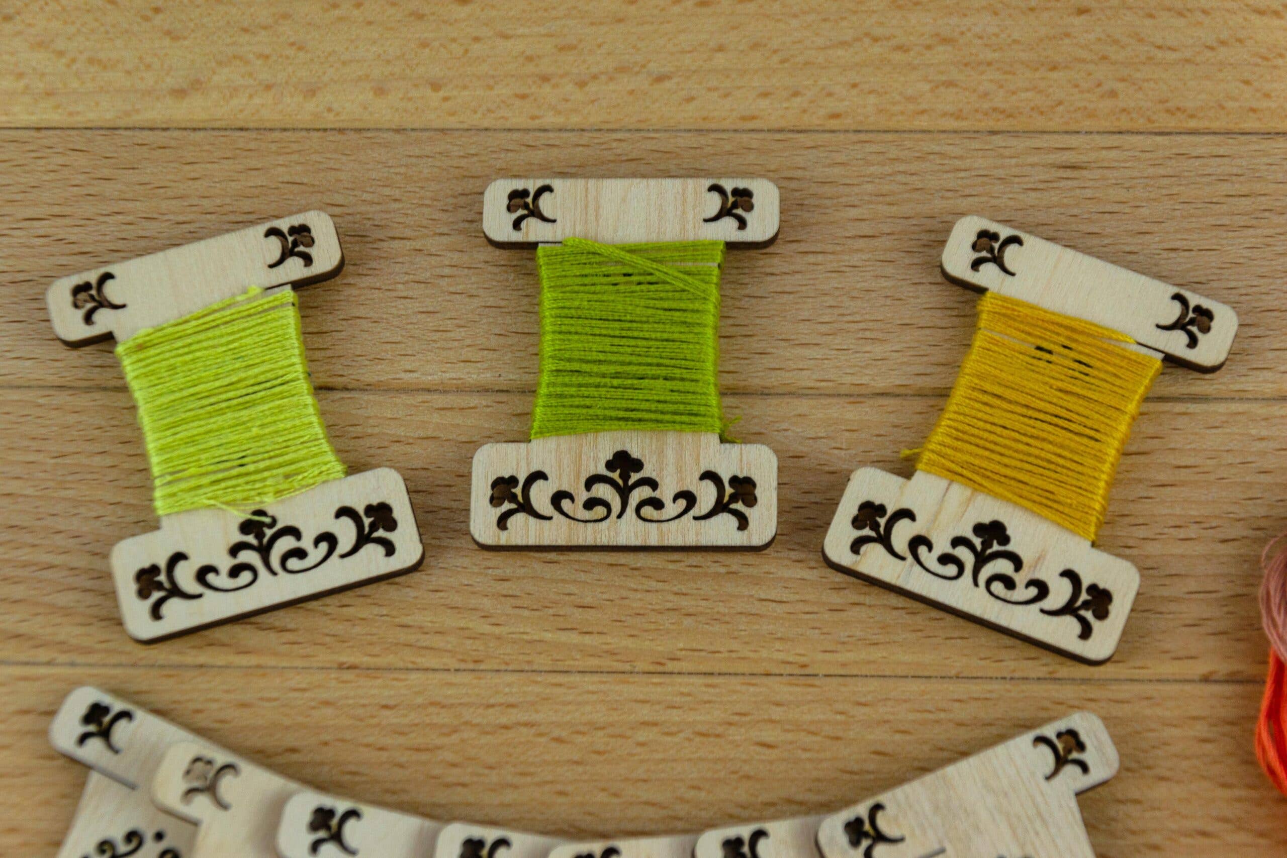 Engraved wooden thread bobbins for embroidery thread (10 per pack)