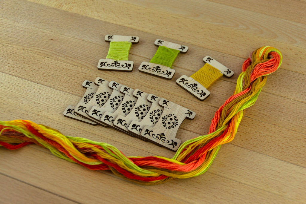 Engraved wooden thread bobbins for embroidery thread (10 per pack)