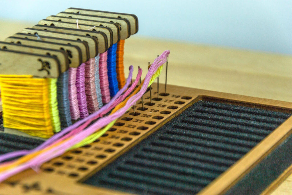 Square foam stand for wooden, acrylic and other bobbins (spools) thickness 3mm with holes for needles